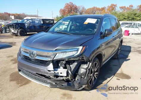 2021 Honda Pilot Awd Touring 7 Passenger z USA, uszkodzony, nr VIN 5FNYF6H62MB033604